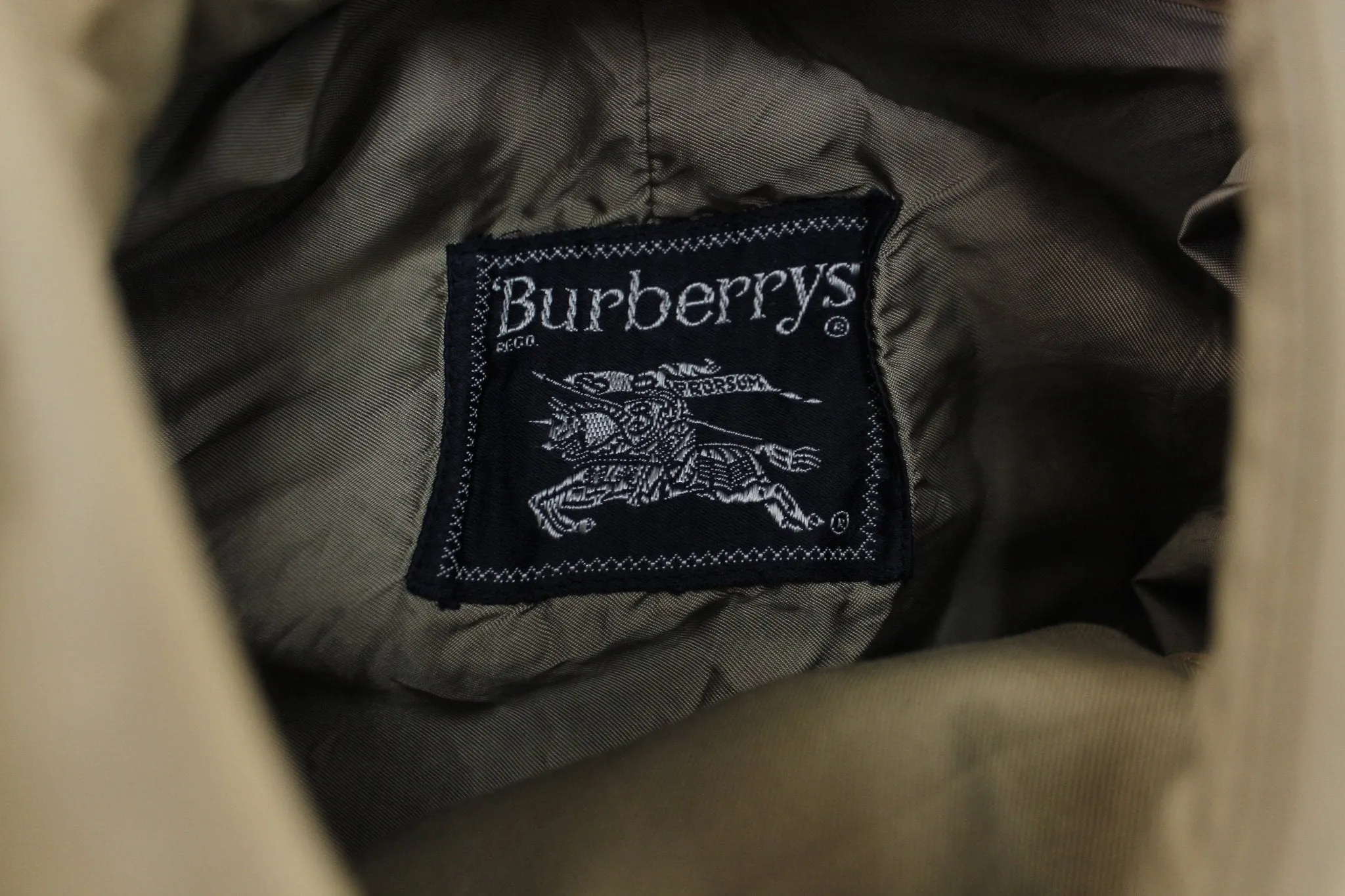Burberry's Tan Trench Coat